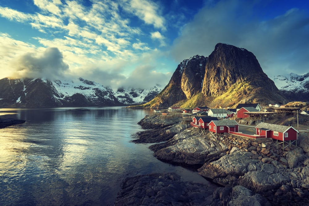 Fishing hut at spring sunset - Reine, Lofoten islands, Norway